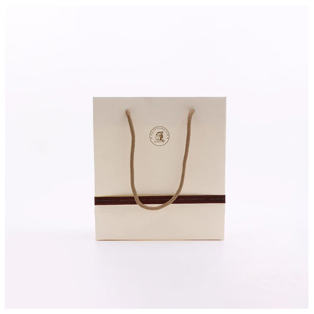 Wholesale Low Price Laminated Shopping Bags Biodegradable Gift Packing Logo Paper Bag Luxury Clothing Eco-friendly Paper Bag